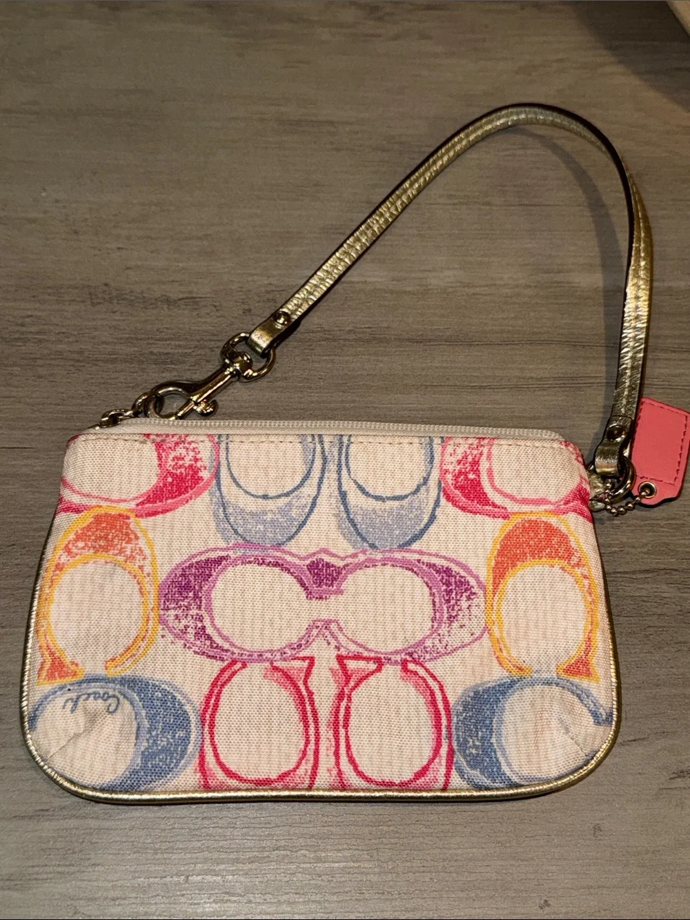 Coach Multicolor Signature Wristlet with Pink, Purple, Blue & Yellow Accents